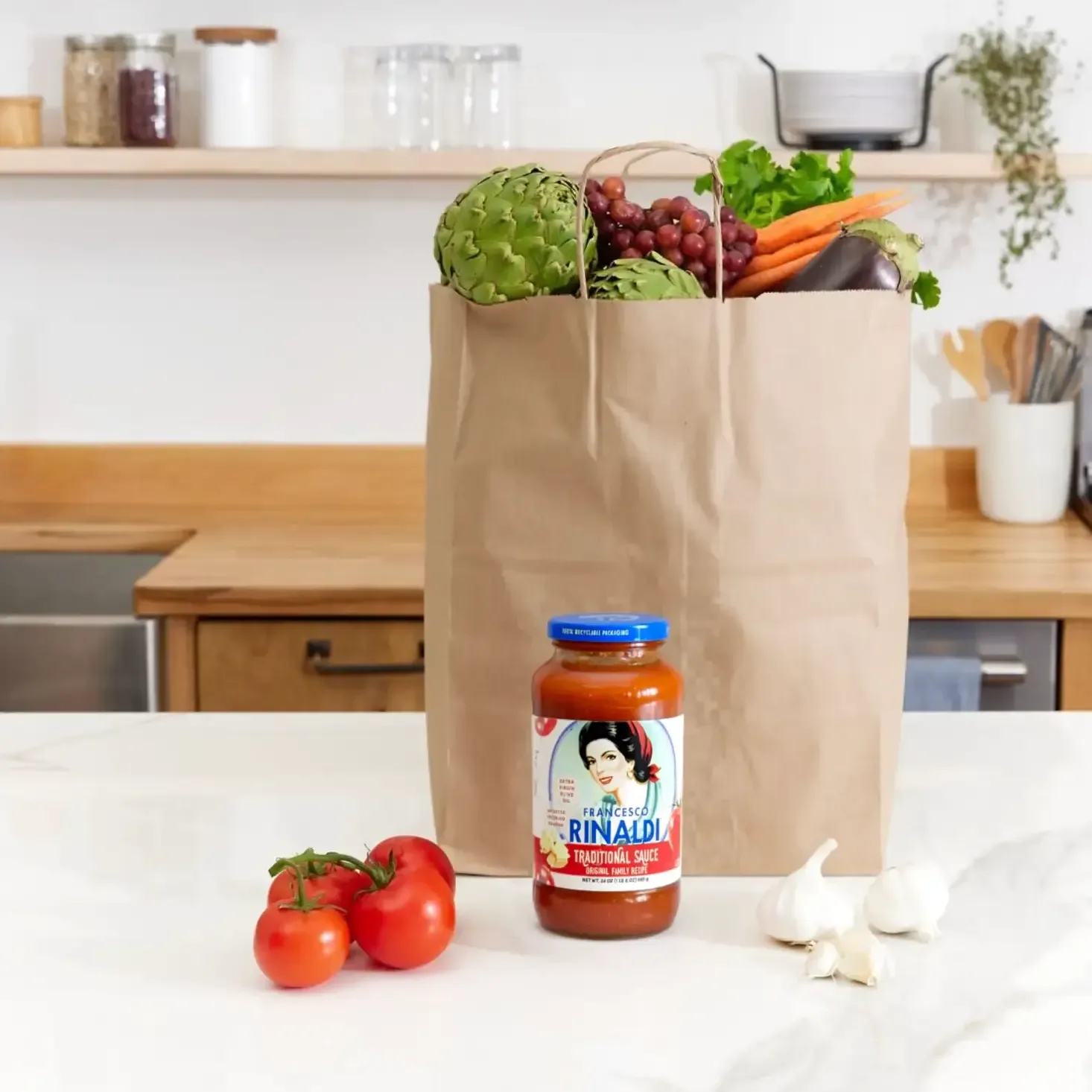 Brown bag of fresh produce groceries; jar of Francesco Rinaldi sauce in kitchen.