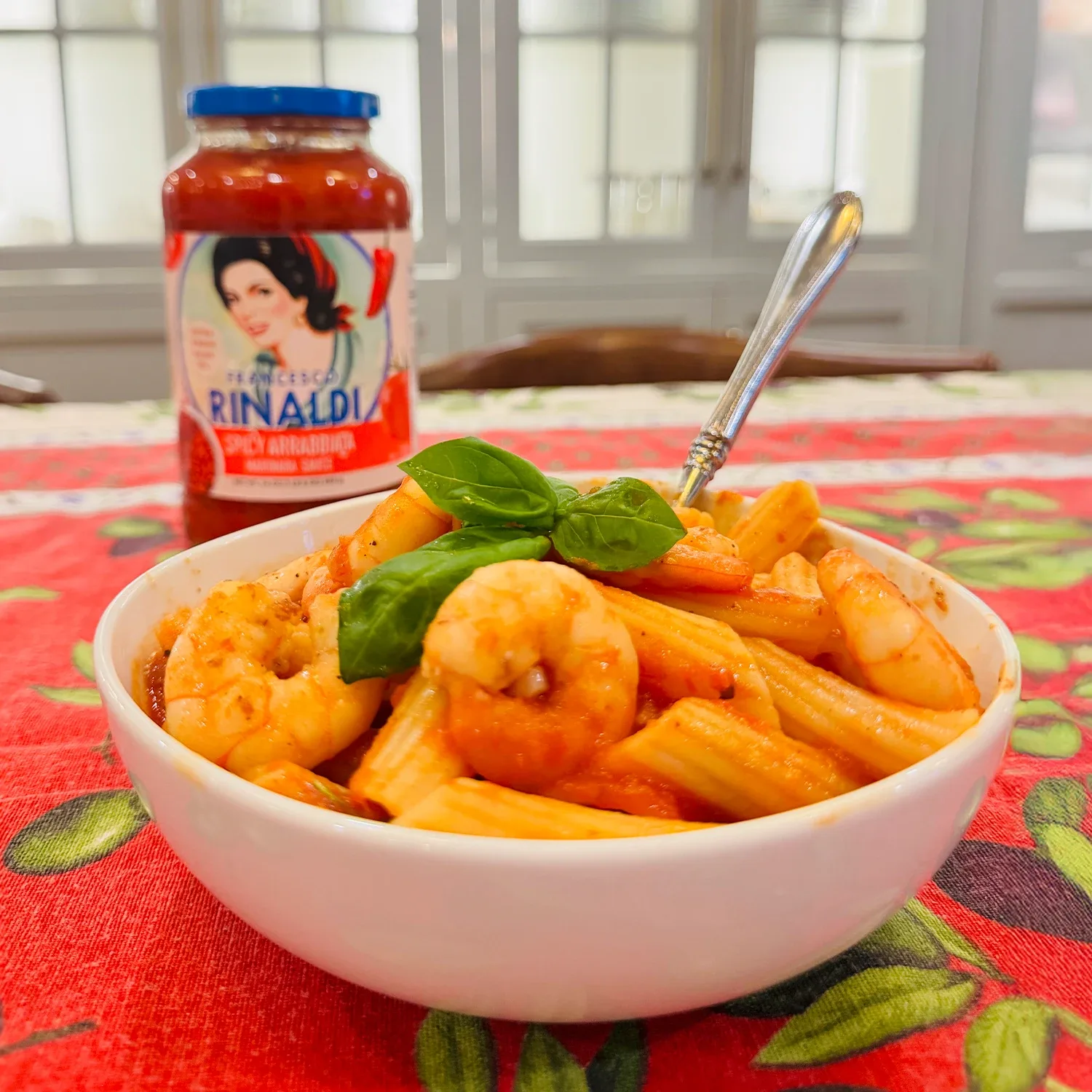 Bowl of pasta and shrimp made with Francesco Rinaldi Arrabbiata Sauce.